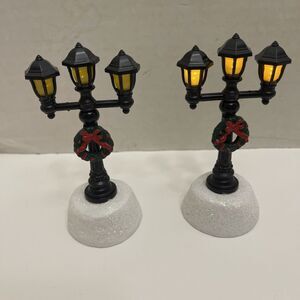 2 Christmas Village Celebrations by L&C Triple Lamp Posts Lighted 4.75" high